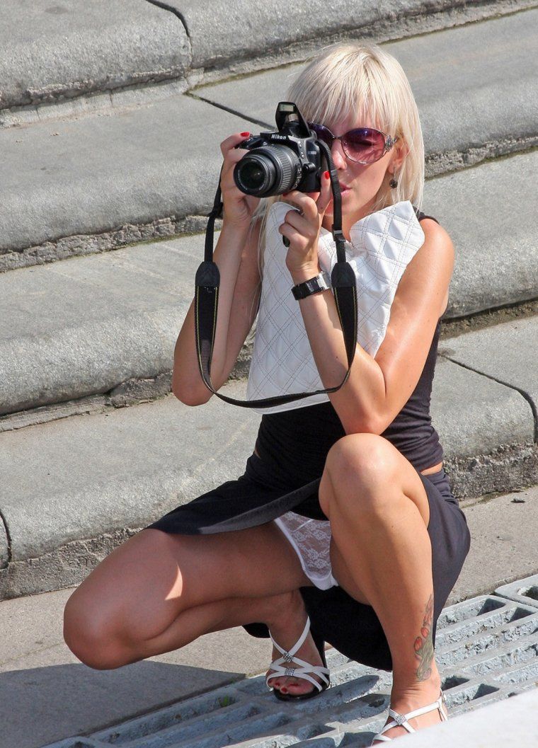 Woman flashes camera